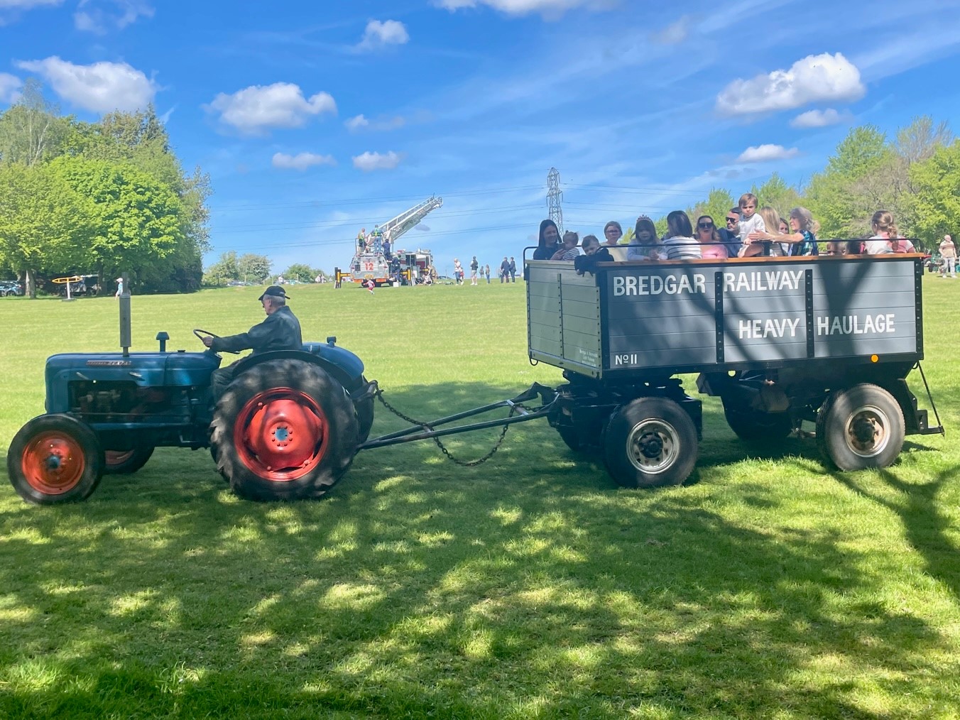 Fordson Major pulls trailer for visitor rides.